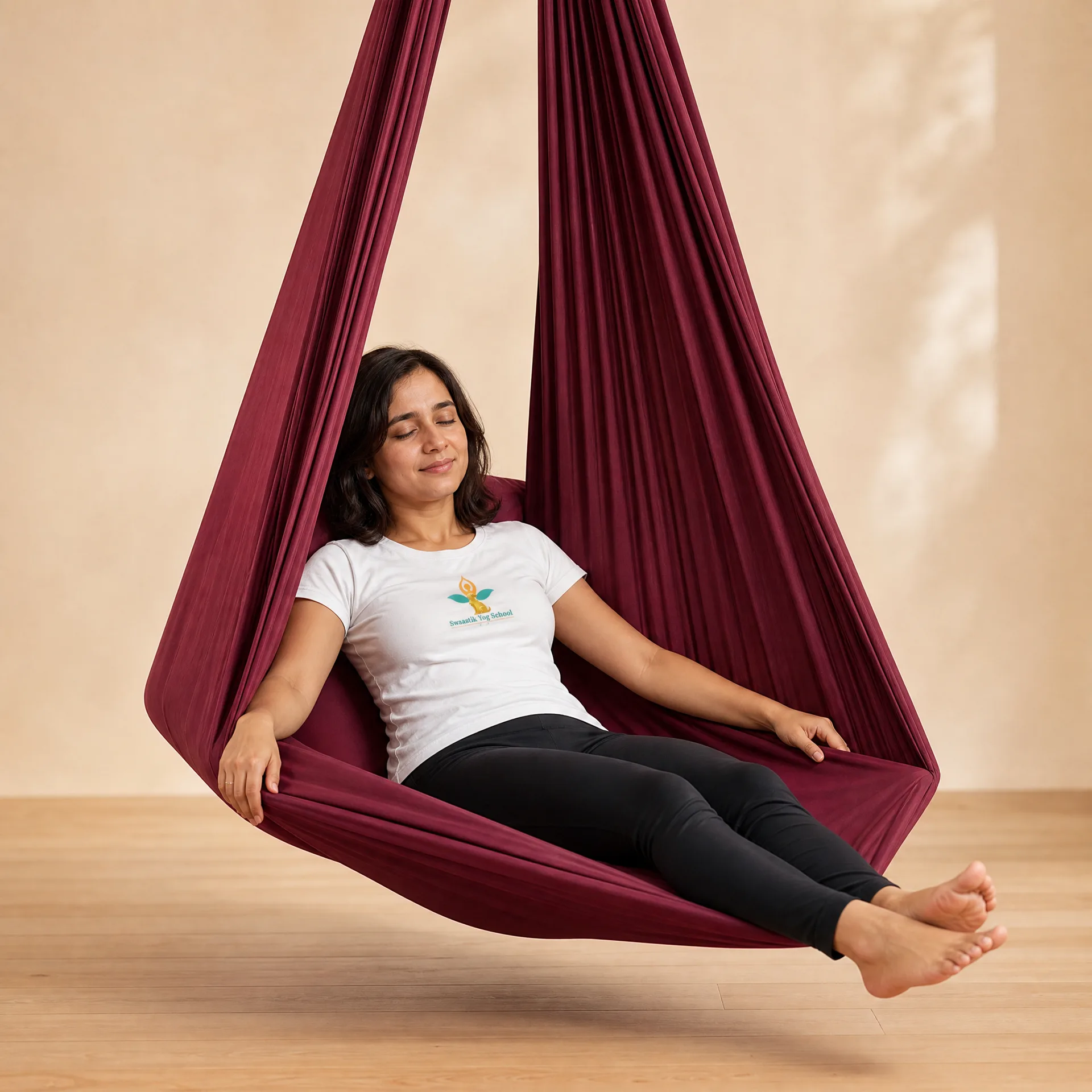 Savasana in the cocoon — the hammock fully wrapped and closed