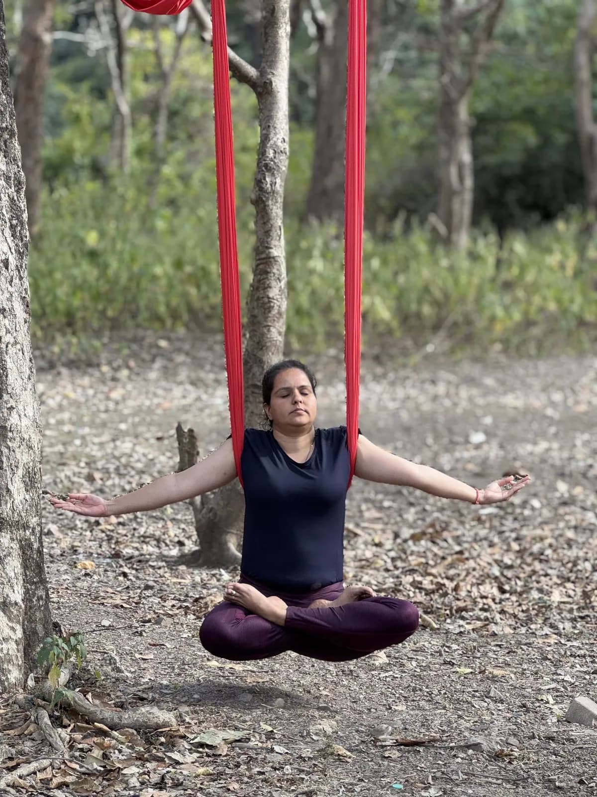 Seated meditation suspended a few inches above the ground