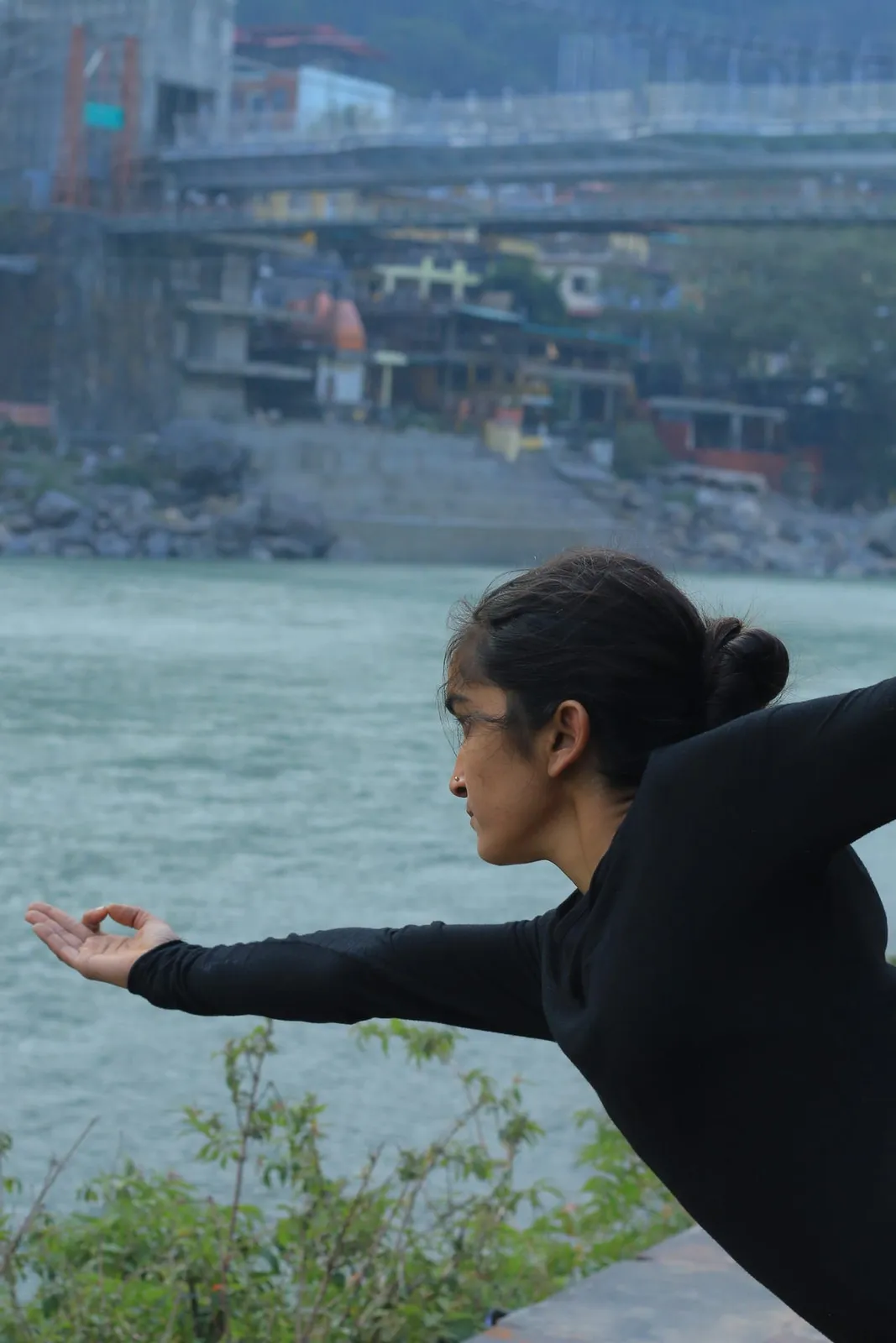Morning practice with the Ram Jhula bridge behind
